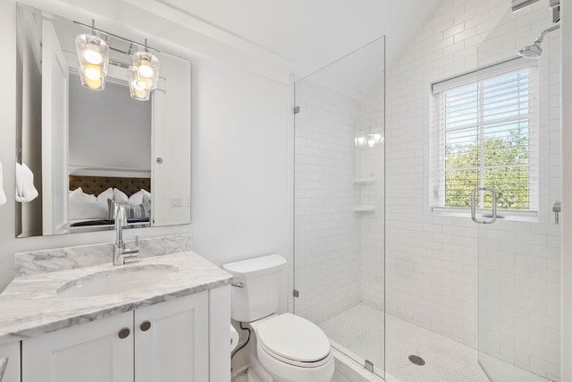 bathroom with vanity, toilet, walk in shower, and vaulted ceiling