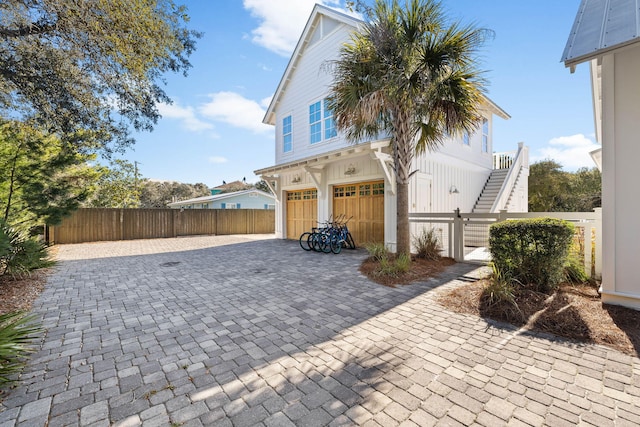 view of front of property with a garage