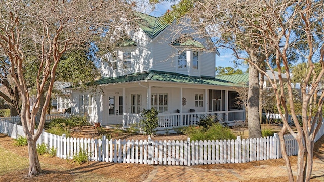 victorian house featuring covered porch