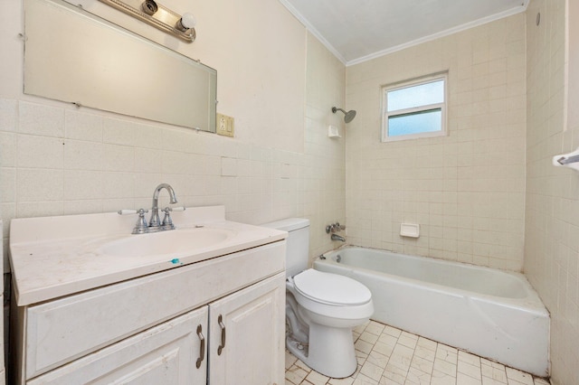 full bathroom featuring toilet, tile walls, ornamental molding, vanity, and tiled shower / bath combo