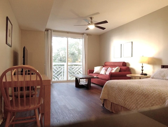 bedroom featuring access to exterior, ceiling fan, and dark wood-type flooring