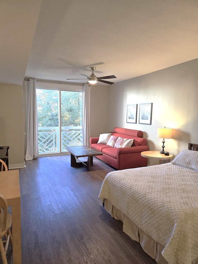 bedroom with ceiling fan, dark hardwood / wood-style flooring, and access to outside