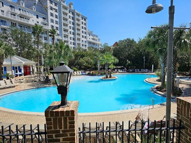 view of swimming pool with a patio