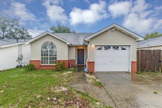 single story home featuring a front yard and a garage