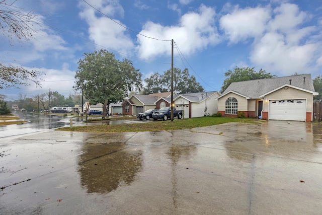 single story home with a garage