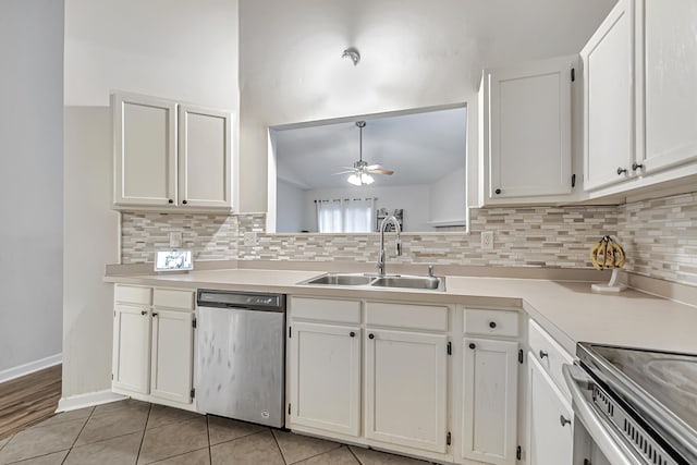 kitchen with white cabinets, ceiling fan, sink, decorative light fixtures, and dishwasher