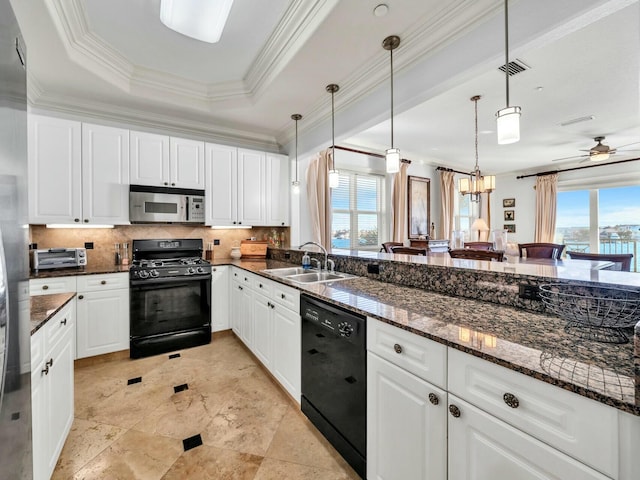 kitchen with white cabinetry, sink, and black appliances