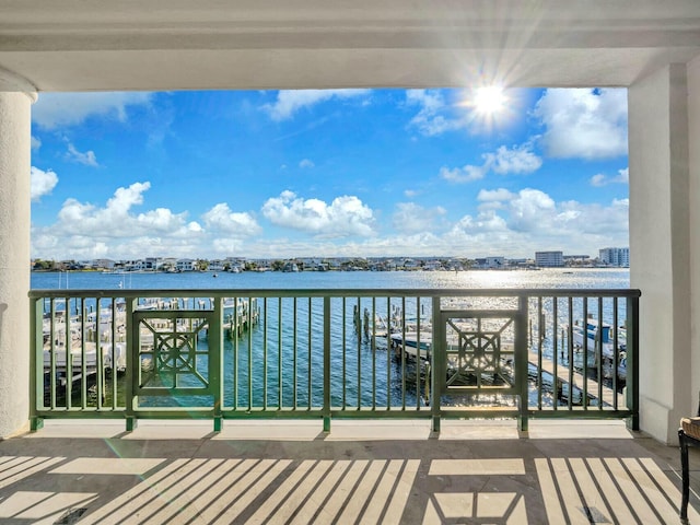 balcony featuring a water view