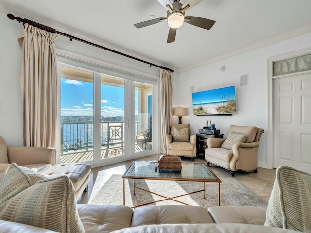 living room featuring ceiling fan and ornamental molding