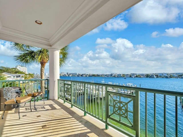 balcony featuring a water view