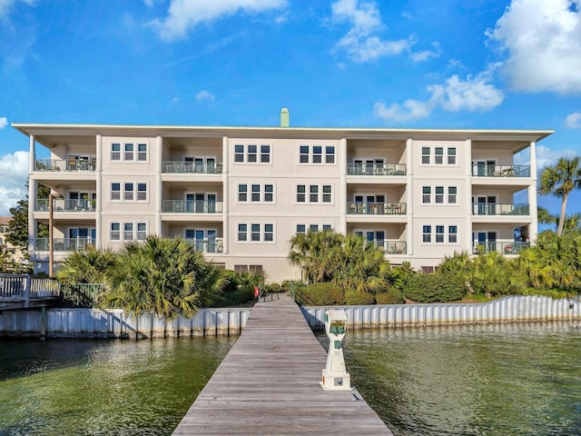 view of building exterior featuring a water view