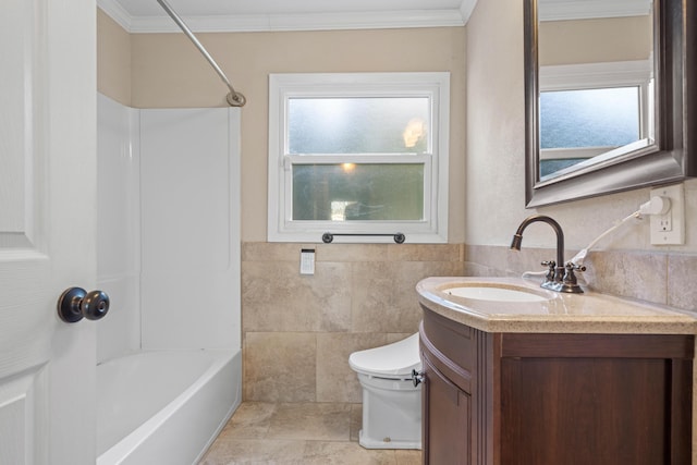 full bathroom with vanity, toilet, crown molding, and bathing tub / shower combination