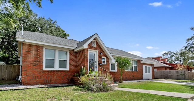 view of front of home with a front yard