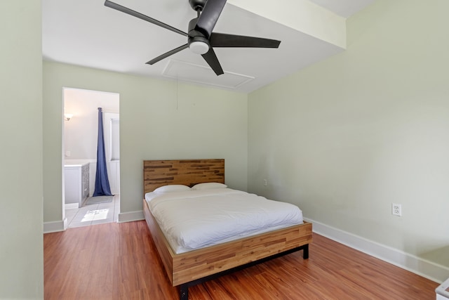 bedroom with ceiling fan and hardwood / wood-style floors