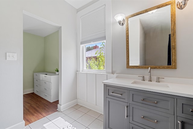 bathroom featuring tile patterned floors and vanity