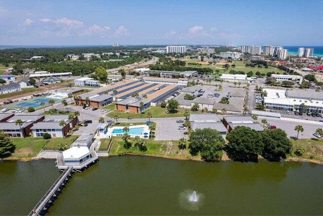 birds eye view of property featuring a water view