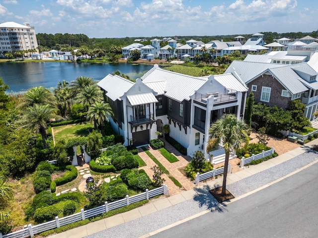 drone / aerial view with a water view