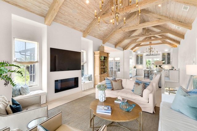 living room with beamed ceiling and wood ceiling