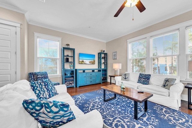 living room featuring crown molding, ceiling fan, and dark hardwood / wood-style floors