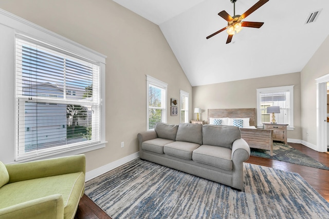 bedroom with high vaulted ceiling, dark hardwood / wood-style floors, and ceiling fan