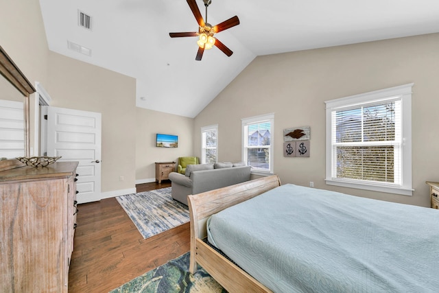 bedroom featuring dark wood-type flooring, high vaulted ceiling, and ceiling fan