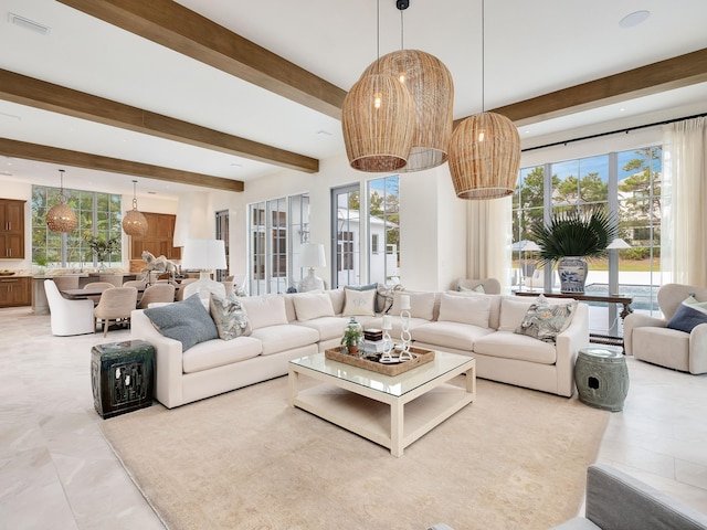 tiled living room with beamed ceiling