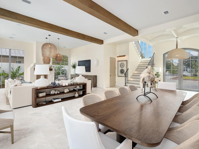 dining room with beamed ceiling