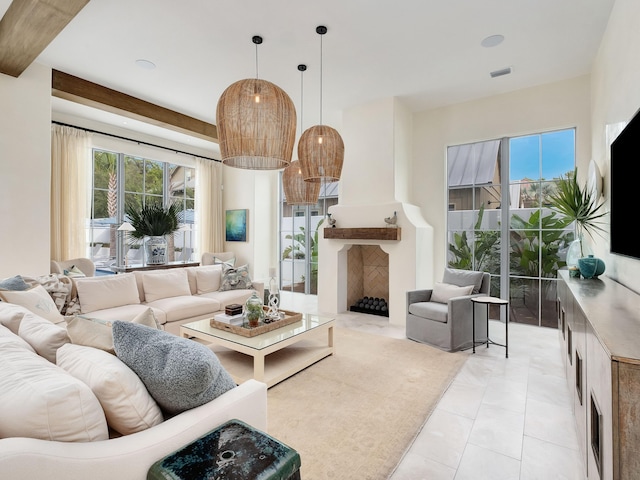 tiled living room featuring beamed ceiling