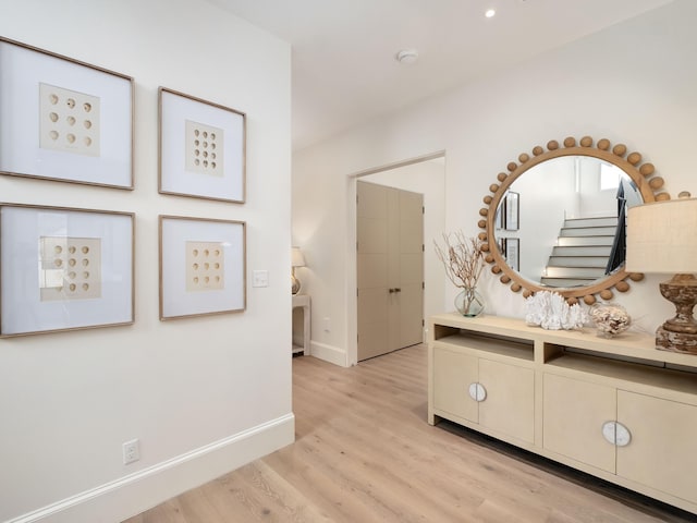 hallway featuring light hardwood / wood-style flooring