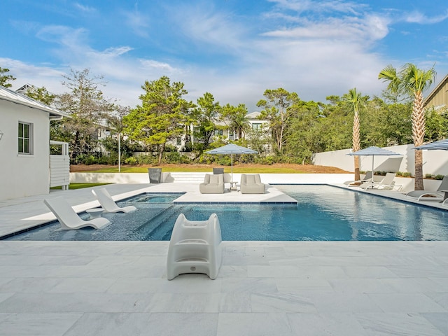 view of pool with a patio area