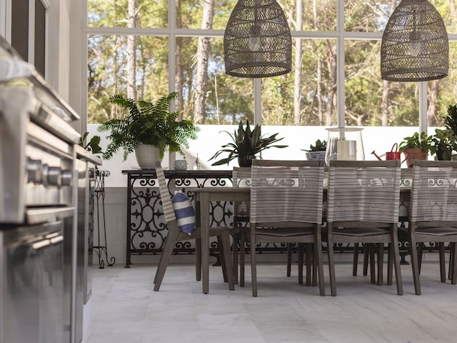 sunroom / solarium with a healthy amount of sunlight