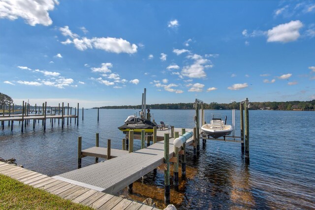 view of dock with a water view and boat lift