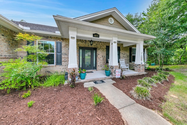 entrance to property with covered porch