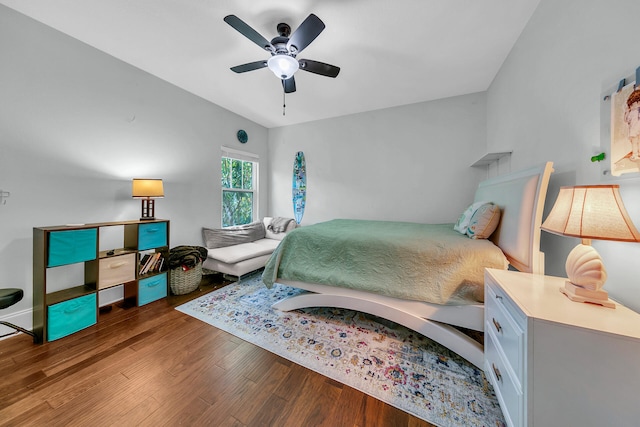 bedroom featuring dark hardwood / wood-style floors and ceiling fan