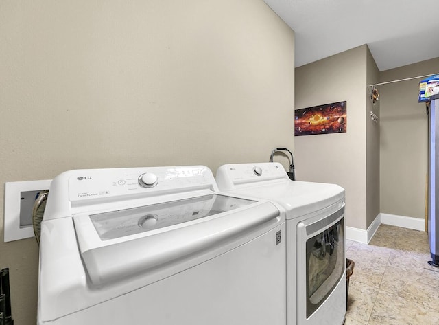 washroom featuring separate washer and dryer