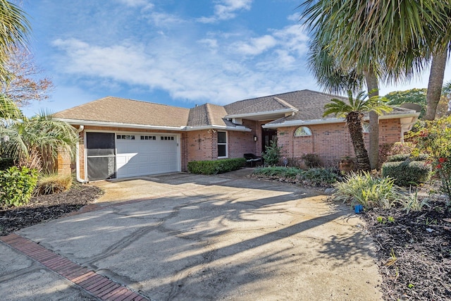 single story home with a garage