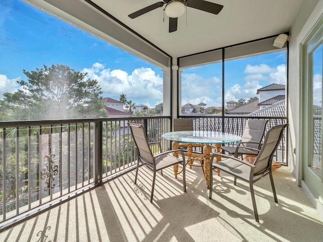 balcony featuring ceiling fan