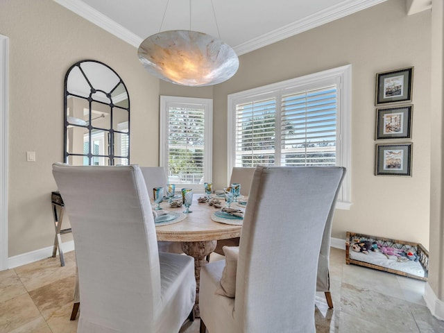 dining area with crown molding