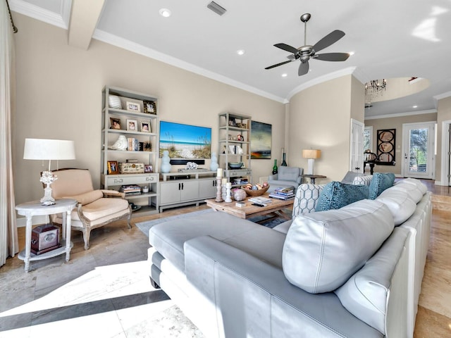 living room with ceiling fan and crown molding