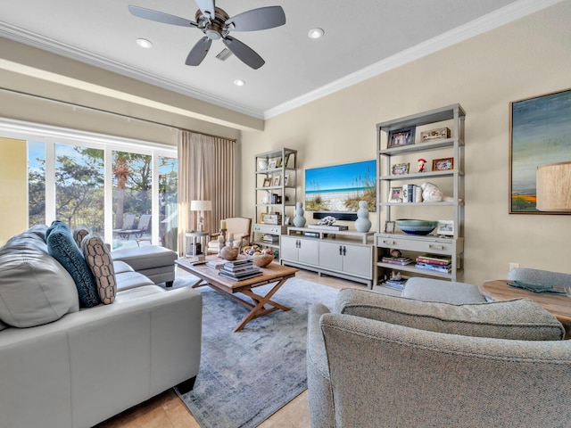 tiled living room featuring ceiling fan and ornamental molding