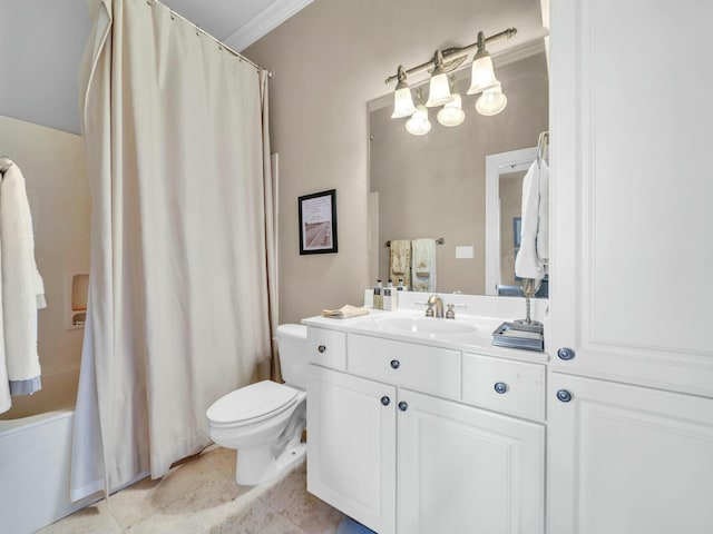 bathroom with toilet, tile patterned flooring, crown molding, and vanity