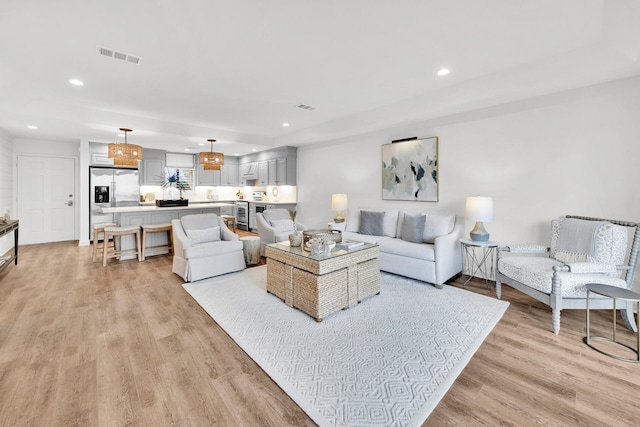 living room featuring light hardwood / wood-style floors