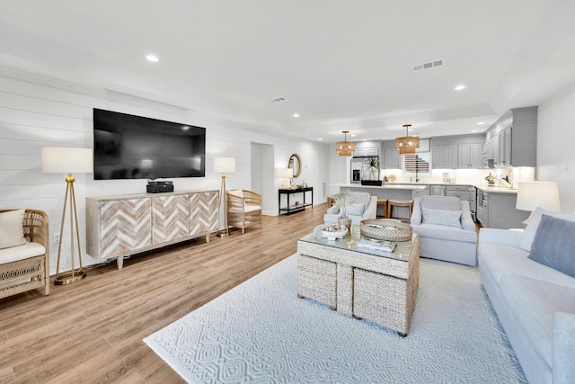 living room featuring light wood-type flooring