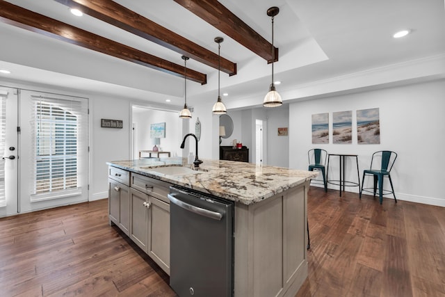 kitchen with light stone counters, sink, pendant lighting, a center island with sink, and dishwasher