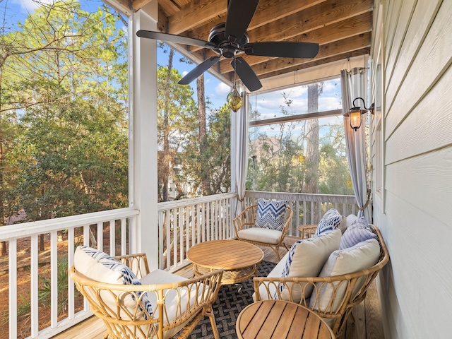 sunroom / solarium with ceiling fan