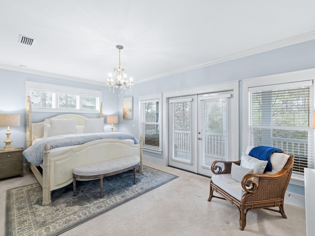 carpeted bedroom featuring multiple windows, access to exterior, and ornamental molding