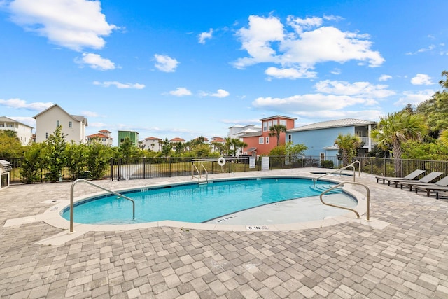 view of pool featuring a patio