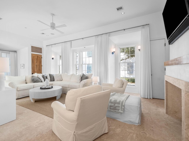 living room with ceiling fan