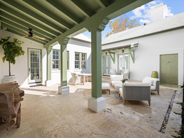 view of patio featuring outdoor lounge area, ceiling fan, and french doors