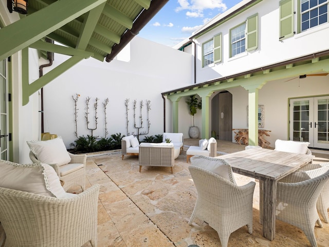 view of patio with an outdoor hangout area, ceiling fan, and french doors